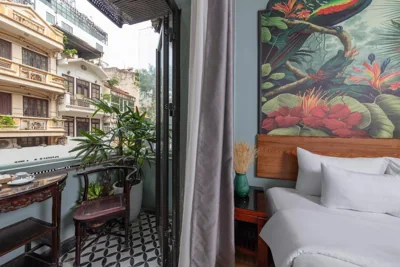 Queen Room with Balcony — Madelise Amica Hotel and Travel